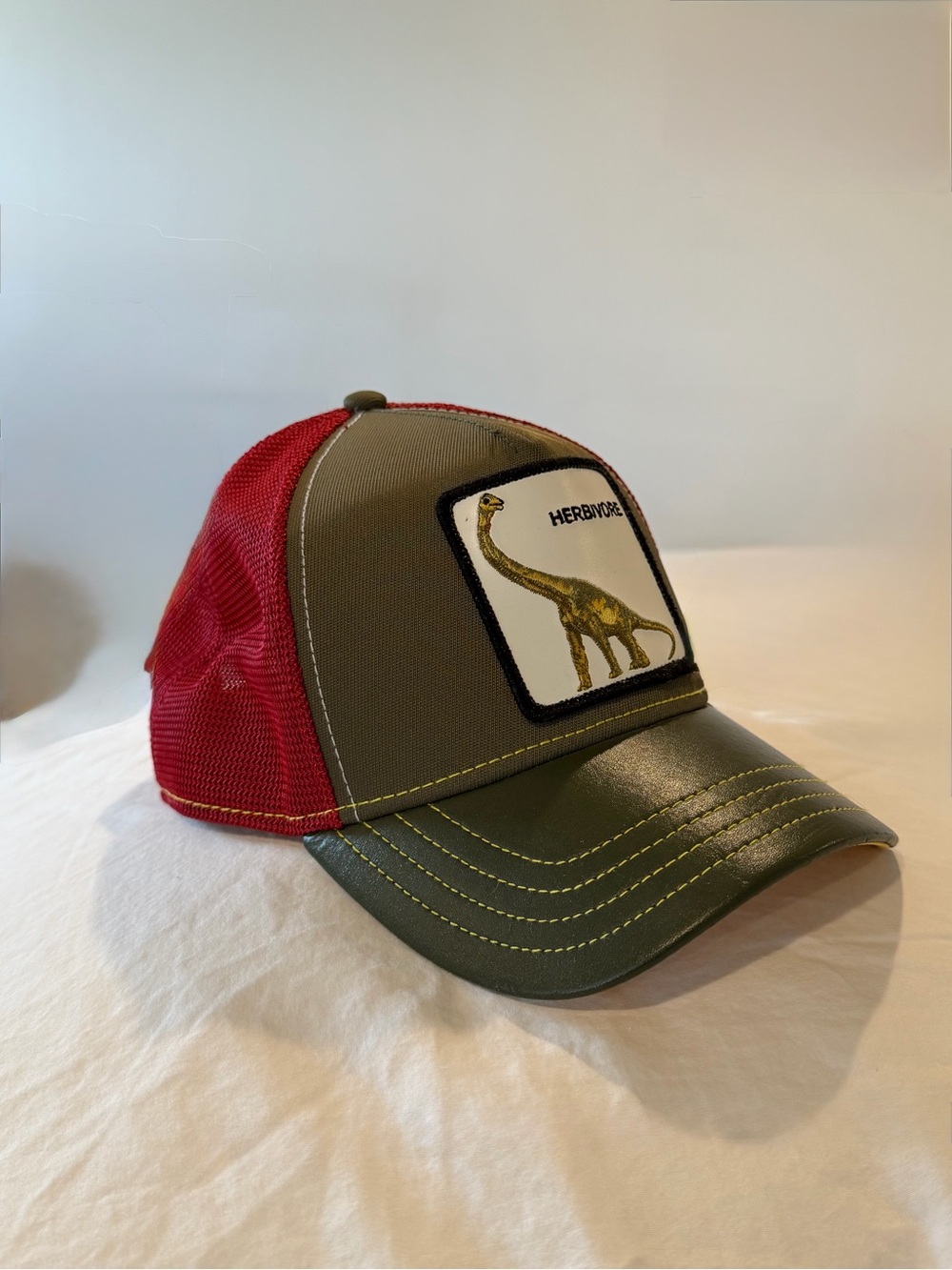 Herbivore Dinosaur Patch Trucker Hat - Olive Green & Red